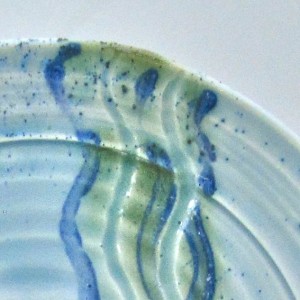 Wheel thrown porcelain plate with slip decoration and carving by Irish ceramic artist McCall Gilfillan of Elements Studio, Downhill, Northern Ireland