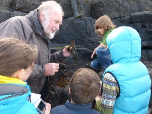 Marine Biologist David Erwin with children on the Castlerock Beach, Northern Ireland