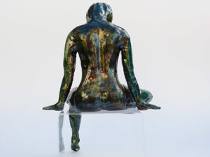 Ceramic figurative sculpture raku by Irish artist McCall Gilfillan seated rear